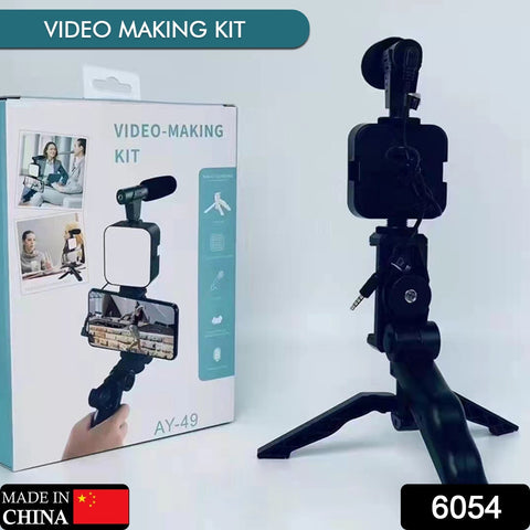 VYRO-7 vlogging kit with mini tripod, microphone, and LED light for video making, displayed with all components set up.